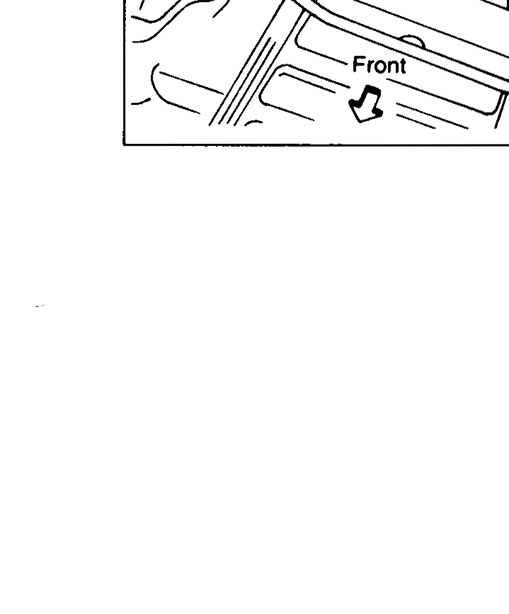 Underside view showing the fuel tank mounting bands and their bolts being removed. Callout: 'Front' (arrow).