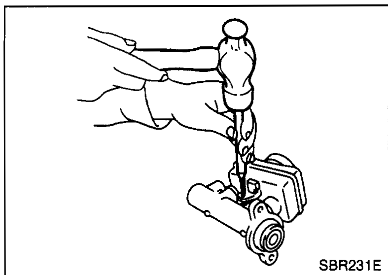 Illustration showing technician driving out elastic pin from cylinder body using a punch and hammer.