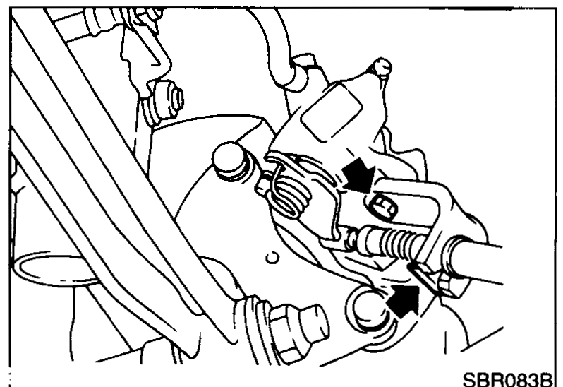 Rear caliper from outboard side with arrow at the brake cable mounting bracket bolt — Step 2.