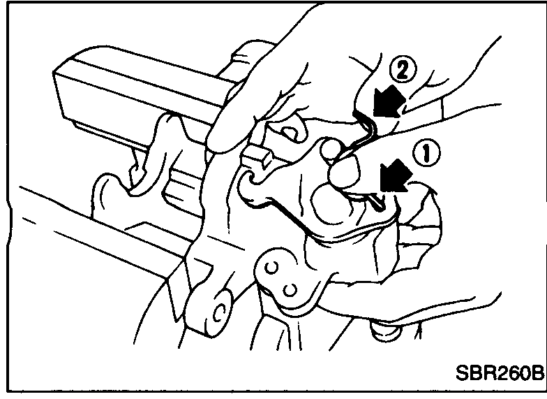 Step 6: long-nose pliers rotating the piston clockwise to screw it into the cylinder until seated.