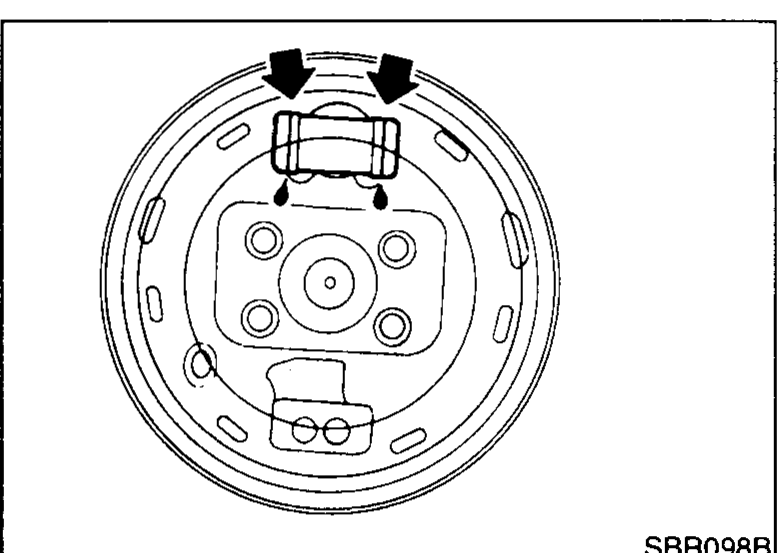 Step 3-4: adjuster assembly being removed; parking-brake cable disconnected from operating lever on secondary shoe.