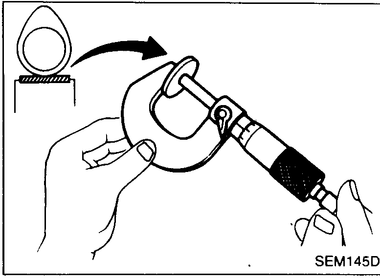 Tool (B) holds the lifter down; a magnetic finger reaches into the lifter recess to extract the adjusting shim.