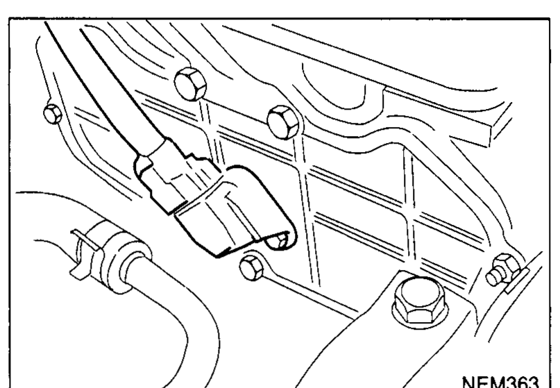 Close-up photograph of the camshaft position sensor (PHASE) installed on the cylinder head, showing the sensor body and connector to be removed.