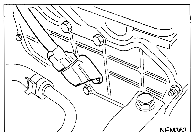 Close-up of the camshaft position sensor (PHASE) on the cylinder head with its connector to be removed.