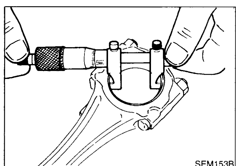 Connecting rod with cap installed in a vice; bore gauge measuring inner diameter of the big-end bore.