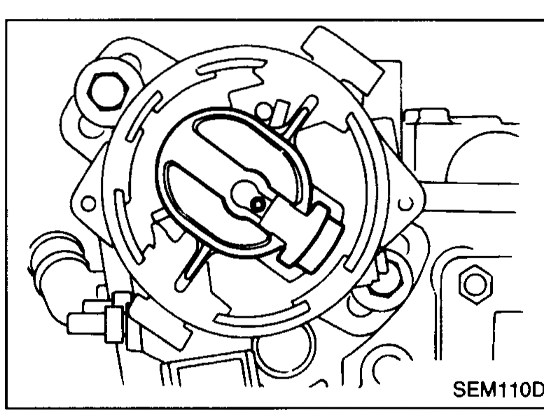 Distributor cap removed; rotor and base of distributor visible mounted on the cylinder head. Used to verify No.1 cylinder TDC by rotor position.