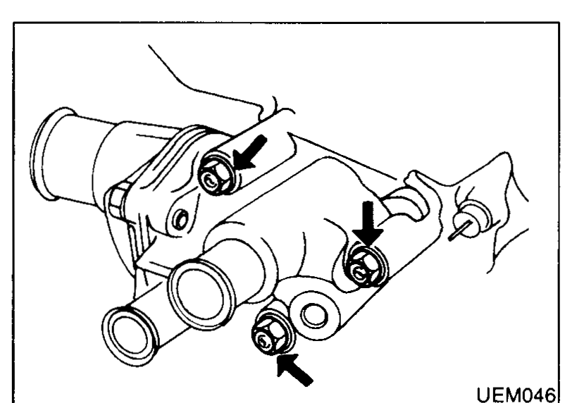 Thermostat housing on the cylinder head with arrows indicating the bolts to be removed.