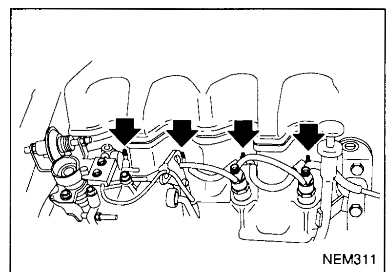 Top view of the cylinder head showing four glow-plug positions with arrows pointing down onto each glow-plug bore — illustrates step 2 (remove glow cable and glow plugs).