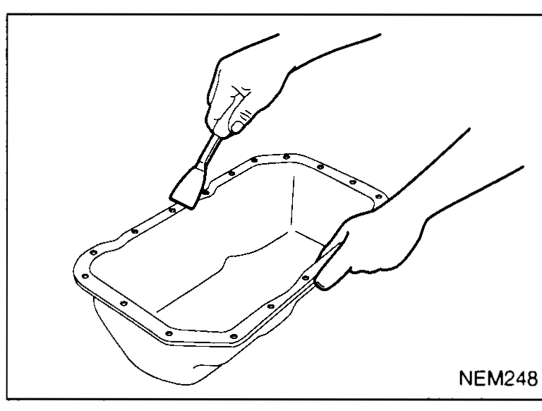 Hand sliding the seal-cutter along the pan flange using a hammer to tap it along — illustrating step 7-2 (slide tool by tapping with a hammer, remove oil pan).