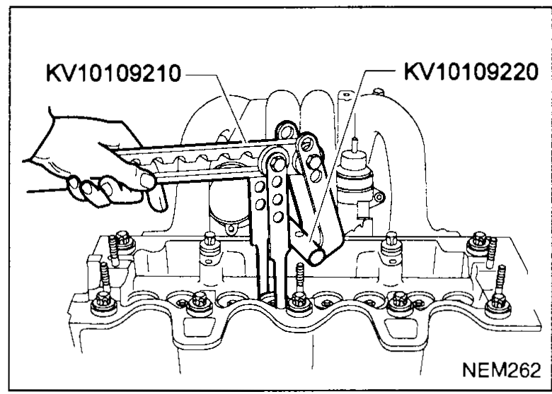 Hand using valve spring compressor SST KV10109210 with adapter KV10109220 to compress a valve spring for cotter removal — illustrates disassembly step 6.