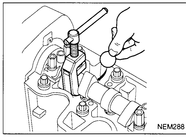 Hand using a micrometer on a removed shim to determine its thickness — illustrates the 'using a micrometer determine thickness of removed shim' bullet (step 5).