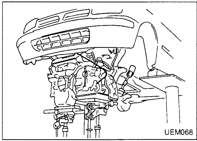 Underside view of the front cross/centre member with arrows at the four mounting bolts being removed — illustrates step 23.