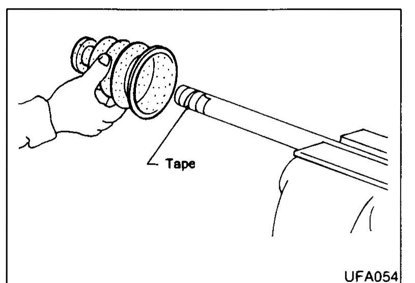 Drive shaft end with the boot in hand and the splined/serrated section wrapped in 'Tape' before sliding the boot on, to prevent serrations damaging the boot.