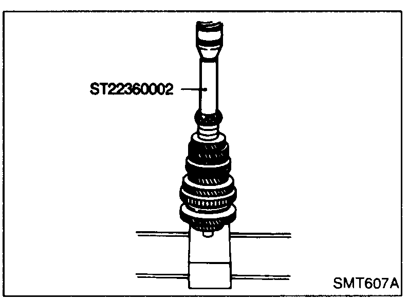 C-ring holder, C-ring and thrust washer being installed on the mainshaft (reverse of disassembly fig SMT592).