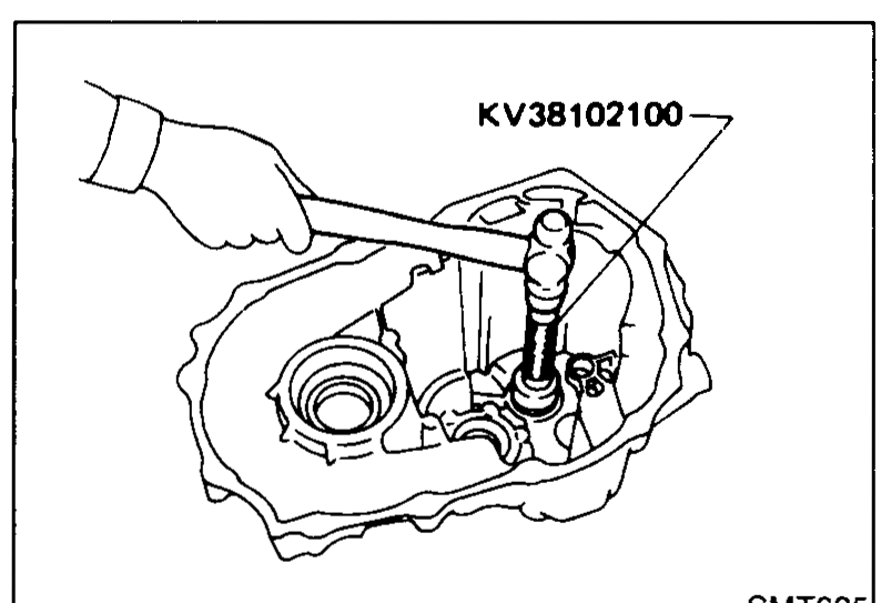Special tool KV38102100 (bearing installer) being used through the transmission case to install the input shaft rear bearing.