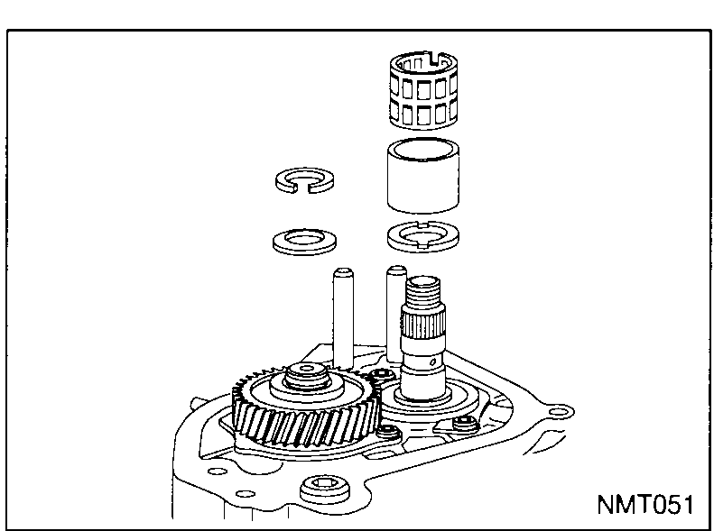 Top view of the input shaft and mainshaft tops in the housing with the input shaft snap ring, spring washer, mainshaft needle bearing, spacer and washer being lifted off.