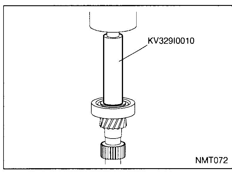 Input shaft held vertically while a puller/press removes the front ball bearing from the shaft.