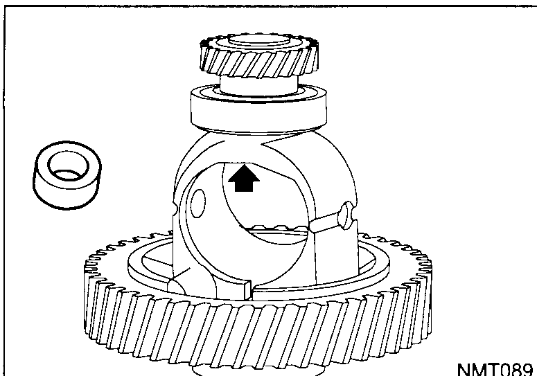 Differential case shown vertically with the side-gear spacer being seated inside; a black arrow points down into the case bore at the spacer's mounting position. A loose spacer ring sits to the left of the case.