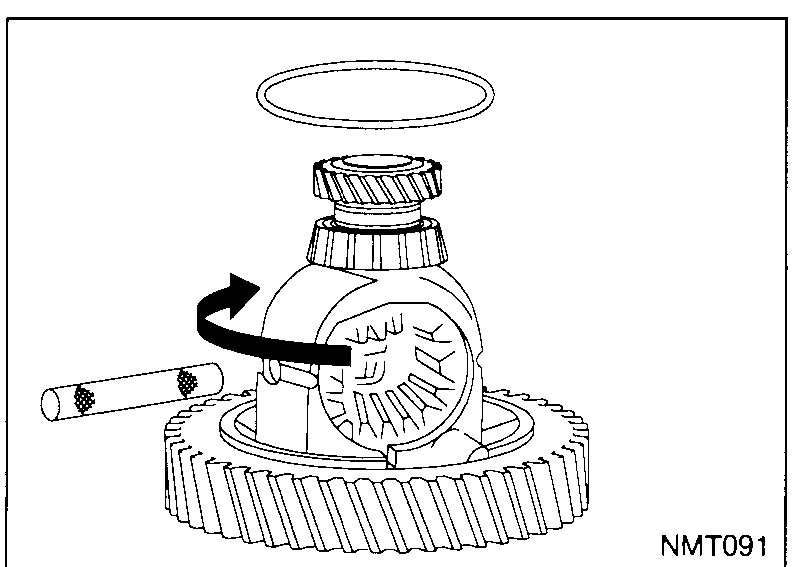 Two hands seating a pinion-mate gear with its thrust washer inside the differential case. The case sits on its ring-gear face.