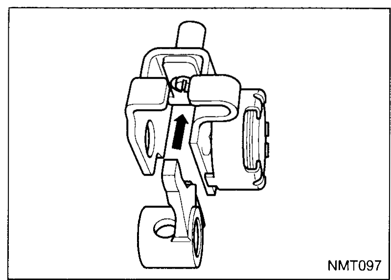 Close-up of the shift interlock key with the engagement finger being inserted into its slot. The finger and the interlock-key body are shown in isolation against a black background.