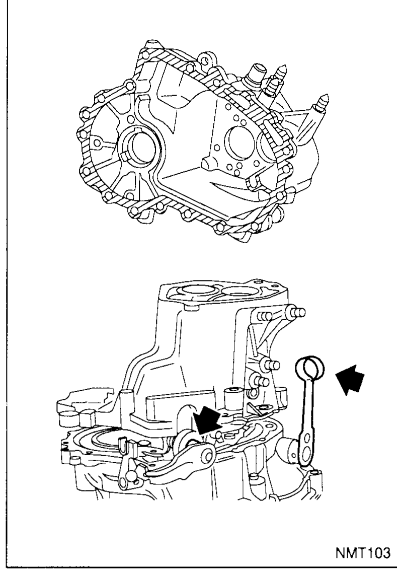 Outer face of the transaxle casing (clutch-housing side). Two black arrows point to the engagement-shaft seal hole and the clutch release lever position — a small circular item (seal) is shown floating above the case.