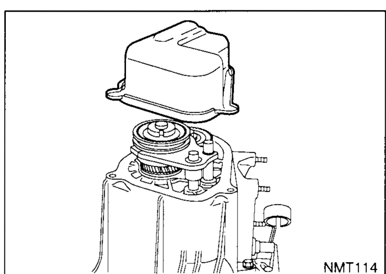Top of the transaxle with the 5th-gear cover being lowered into place over the 5th-gear stack. A new gasket / seal sits on the case flange under the cover. The shift-fork shaft protrudes to the right.